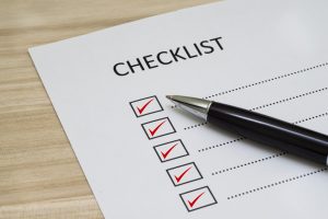 checklist with marks on a paper